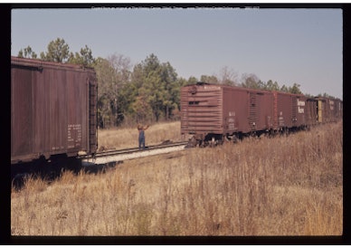 0005 Carl Vinson couples freight cars, 1961